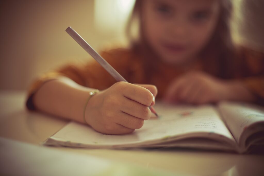 Journaling 101: Child writing in a journal